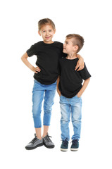 Little kids in t-shirts on white background. Mockup for design