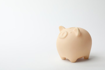 Cute piggy bank on white background. Money saving