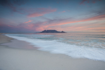 Stunning clouds over Table Mountain in Cape Town South Africa,as seen from blouberg beach, one of the top holiday destinations in the world