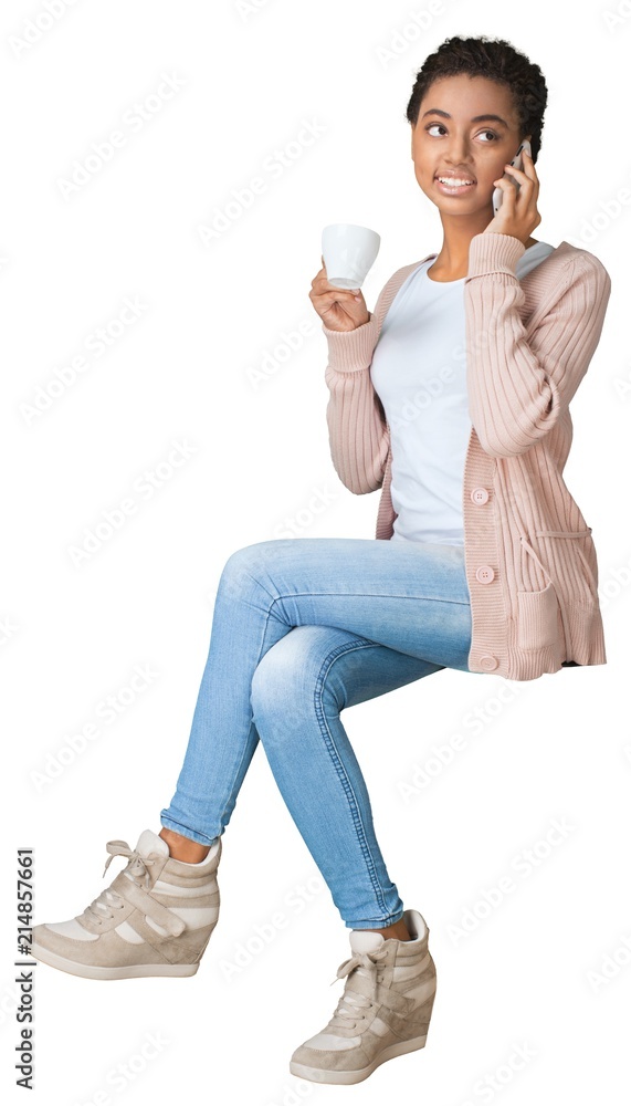 Wall mural Portrait of a Woman Talking on the Phone and Holding a Mug