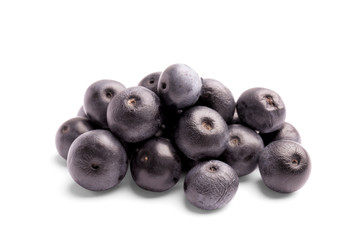 Fresh acai berries on white background