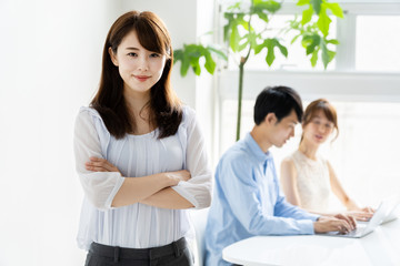 portrait of young asian group in office