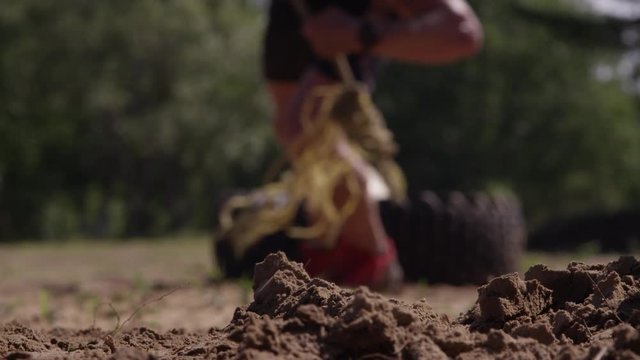 Crossfit Athletes Competing In An Outdoor Adventure Race - Military Style Tests Of Fitness And Strength