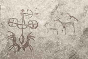 An image of an ancient man and animals on a cave wall. ancient history, era, era.