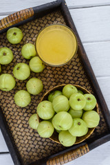 Indian gooseberry on wooden table