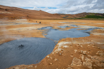 Bubbling Hot with steam. Mud Pots in the Namafjall Geothermal Area, Hverir, Iceland.