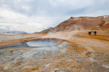 Bubbling Hot with steam. Mud Pots in the Namafjall Geothermal Area, Hverir, Iceland.