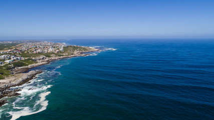 Fototapeta na wymiar Aerial view over the rocks in the Walkerbay reserve in Gansbaai in the Western Cape of South Africa