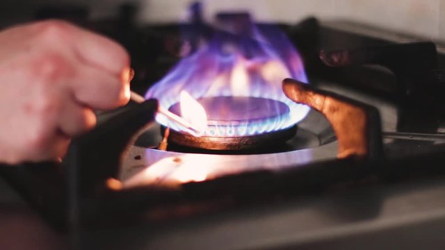 Lighting a stove in slow motion