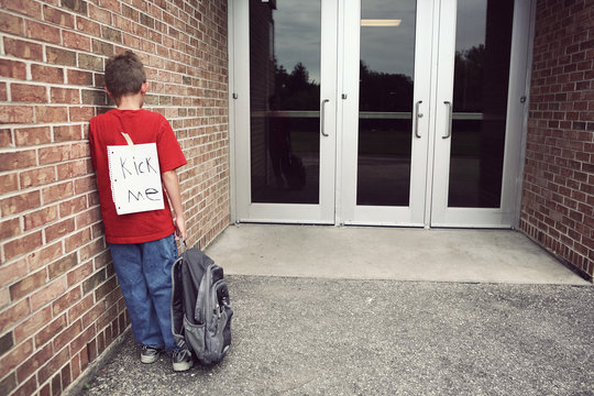 Kick Me Sign On A Childs Back, Bullying Concept