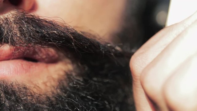 Slow motion close up of a moustache