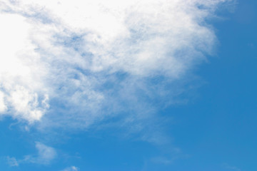 White clouds with blue sky background which the clouds make before storm appear.