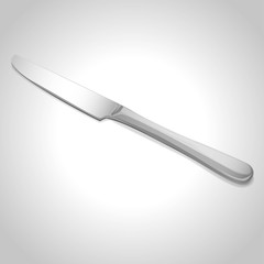 dessert knife on grey background