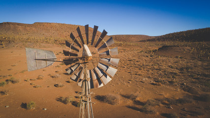 Aerial image over an old windmill / windpump / windpomp in the karoo region of south africa