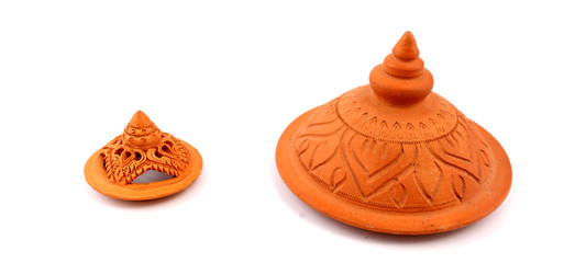 Thai pot with lid and white background.