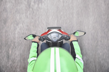 Top view of motorcycle taxi driver