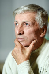 Thoughtful elderly man