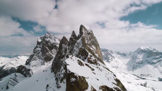 Aerial flight over The Dolomites, Italy in winter. Filmed in 4k.