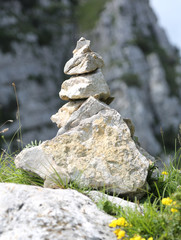 heap of stones called CAIRN in mountain
