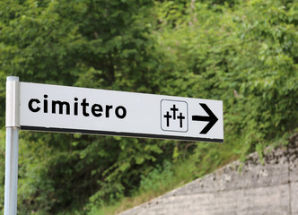 road sign with written cemetery