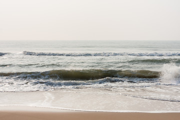 Calm waves on beach - Calm sea waves at morning time on a tropical beach.