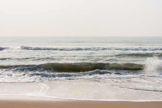 Calm waves on beach - Calm sea waves at morning time on a tropical beach.