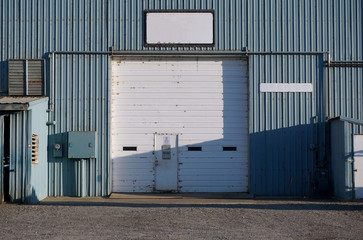 Fototapeta na wymiar industrial garage with roll up door