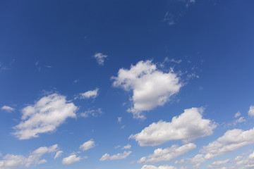 Blue clean sky with white clouds.