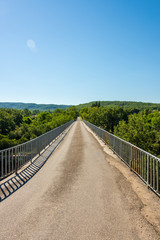 Fototapeta premium Spectacular view along the bridge over the river Ardeche near Pradons in the department Ardeche in France