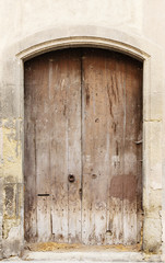The ancient a wooden door in Spain