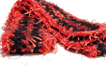 Crochet fun fur black and red scarf striped pattern. Soft fluffy cozy handmade mile a minute scarf for a cold winter day or presents for Christmas or birthdays.