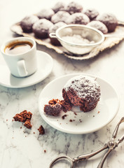 Homemade bakery and sweet muffins with powdered sugar