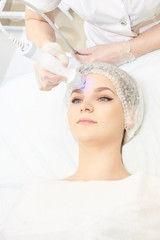 Obraz na płótnie Canvas Facial spa cosmetology procedure. Skin care lift anti age