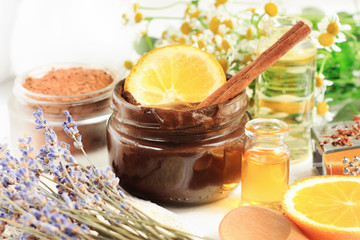 ar of chocolate face mask with aroma orange oil and lavender blossom. Homemade cosmetic products source of vitamins for skincare and beauty treatment.