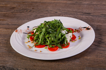 Caprese salad with arugula