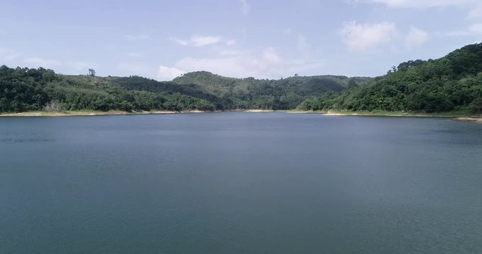 Drone camera flying over water in phuket thailand beautiful nature Aerial view of dam