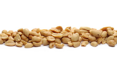 Salty peanuts, pile isolated on white background