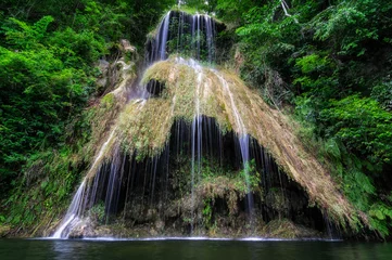 Fototapeten Sommer Pha Nam Yod Waterfall.  © 24Novembers