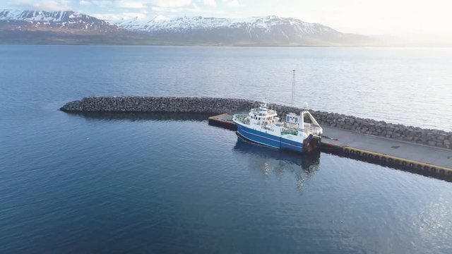 Aerial view of a fishing boat. In a small fishing village in Iceland.