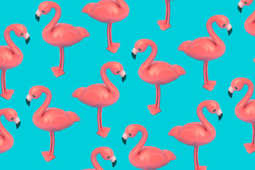 Creative pink flamingo pattern on blue background. Abstract art background. Minimal summer concept.