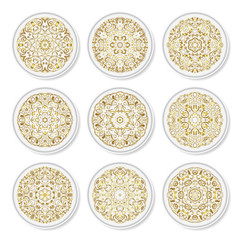 Set of decorative plates with a circular arabic blue pattern, top view. White background. Vector illustration.