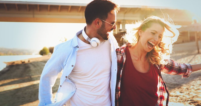 Happy couple smiling and having fun time - Powered by Adobe