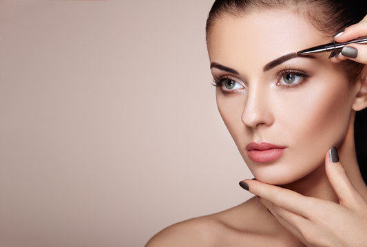 Beautiful Brunette Woman Paints The Eyebrows Beautiful Woman Face Makeup Detail Beauty Girl With Perfect Skin Buy This Stock Photo And Explore Similar Images At Adobe Stock Adobe Stock