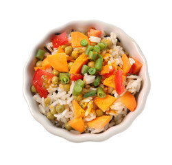 Bowl with tasty boiled rice and vegetables on white background