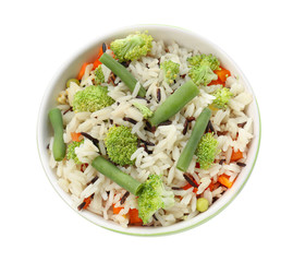 Bowl with tasty boiled rice and vegetables on white background