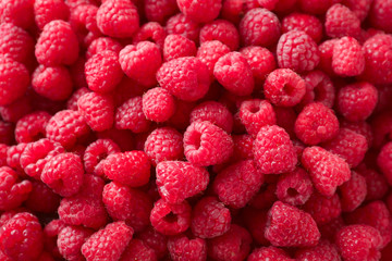 Fresh ripe raspberries as background