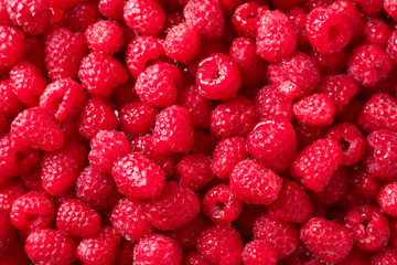 Fresh ripe raspberries as background
