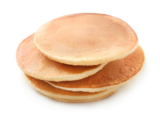 Tasty homemade pancakes on white background