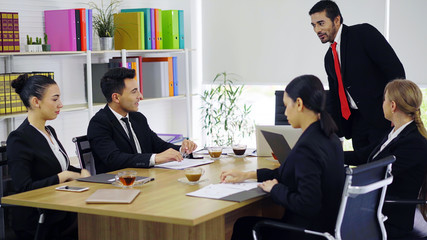 Group of business people having discussion at meeting room