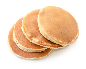 Tasty homemade pancakes on white background